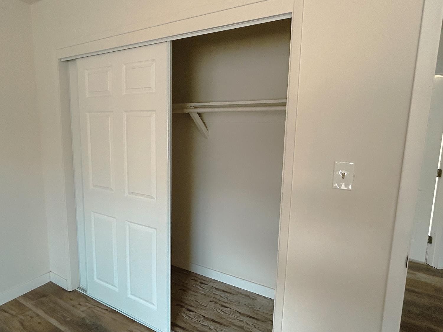 Bedroom closet with new sliding door