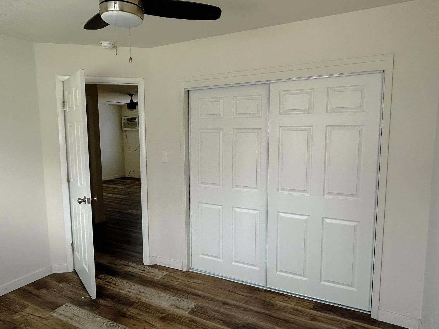 Bedroom with double closet doors