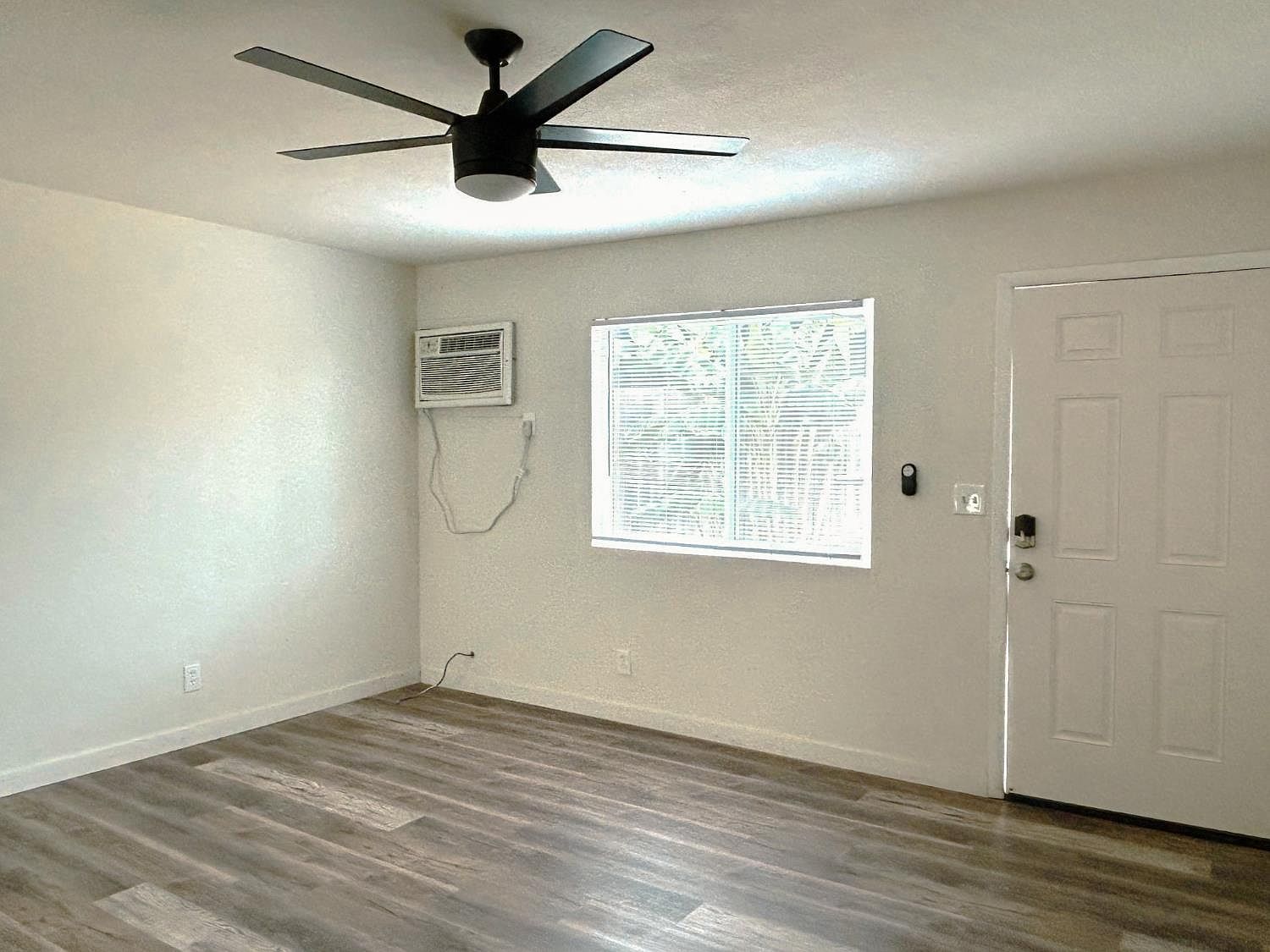 Living room entry with wall air conditioner