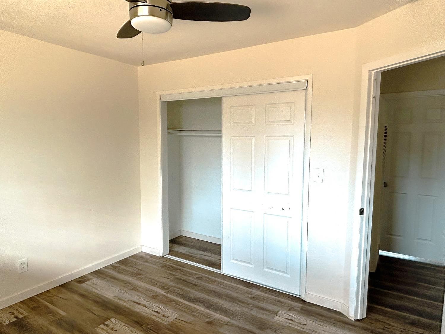 Bedroom with sliding closet