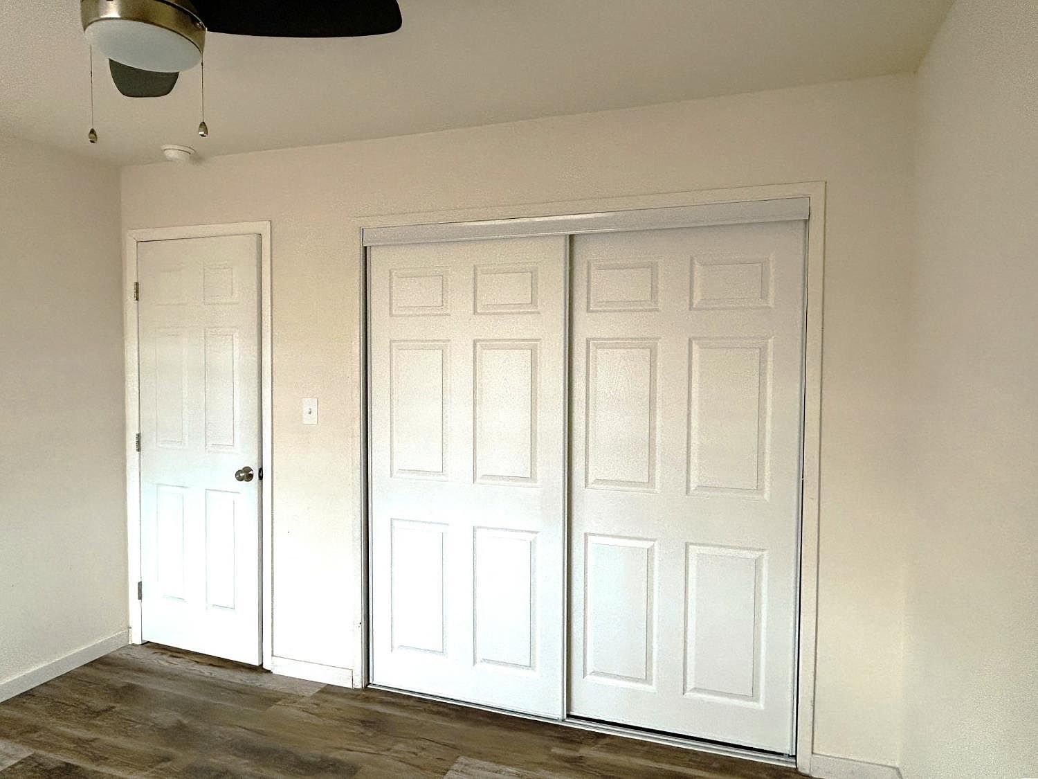 Bedroom with double closet doors