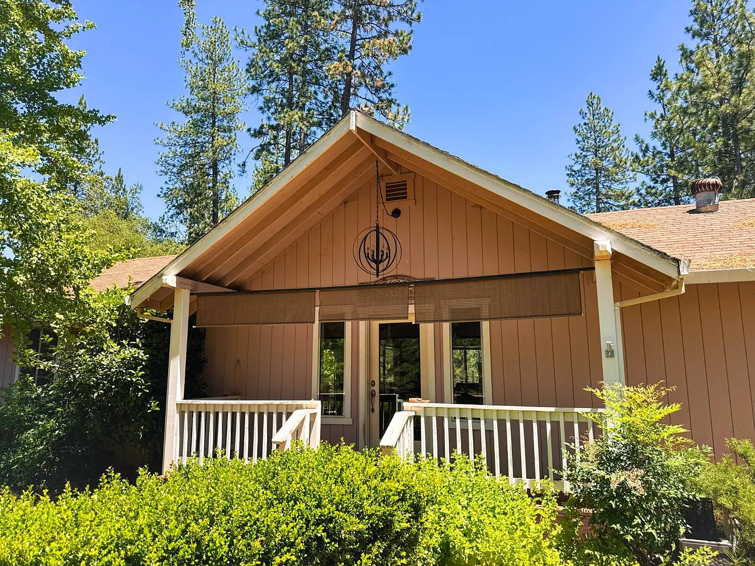 Covered front porch and gabled entry of the home at 6425 Quartz Mine Rd